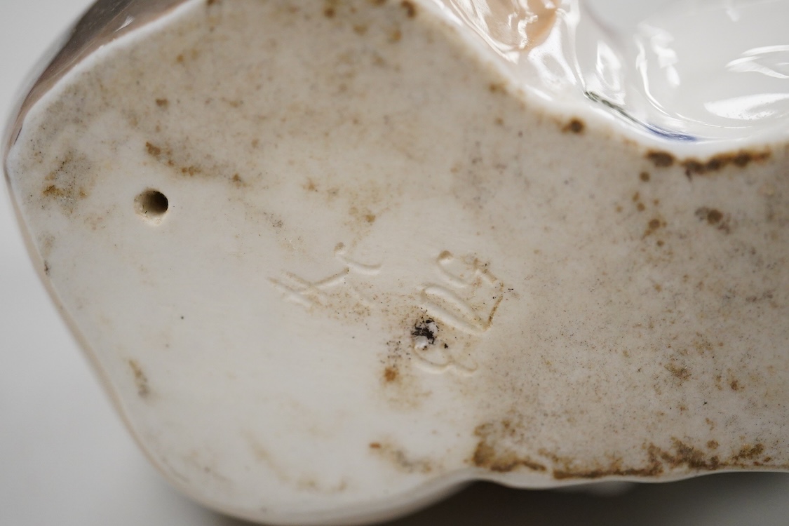 A Royal Copenhagen model of a guinea pig, numbered 503, 14cm wide